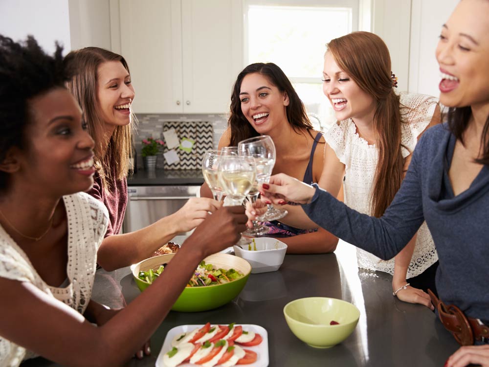 Girls celebrating with dinner together